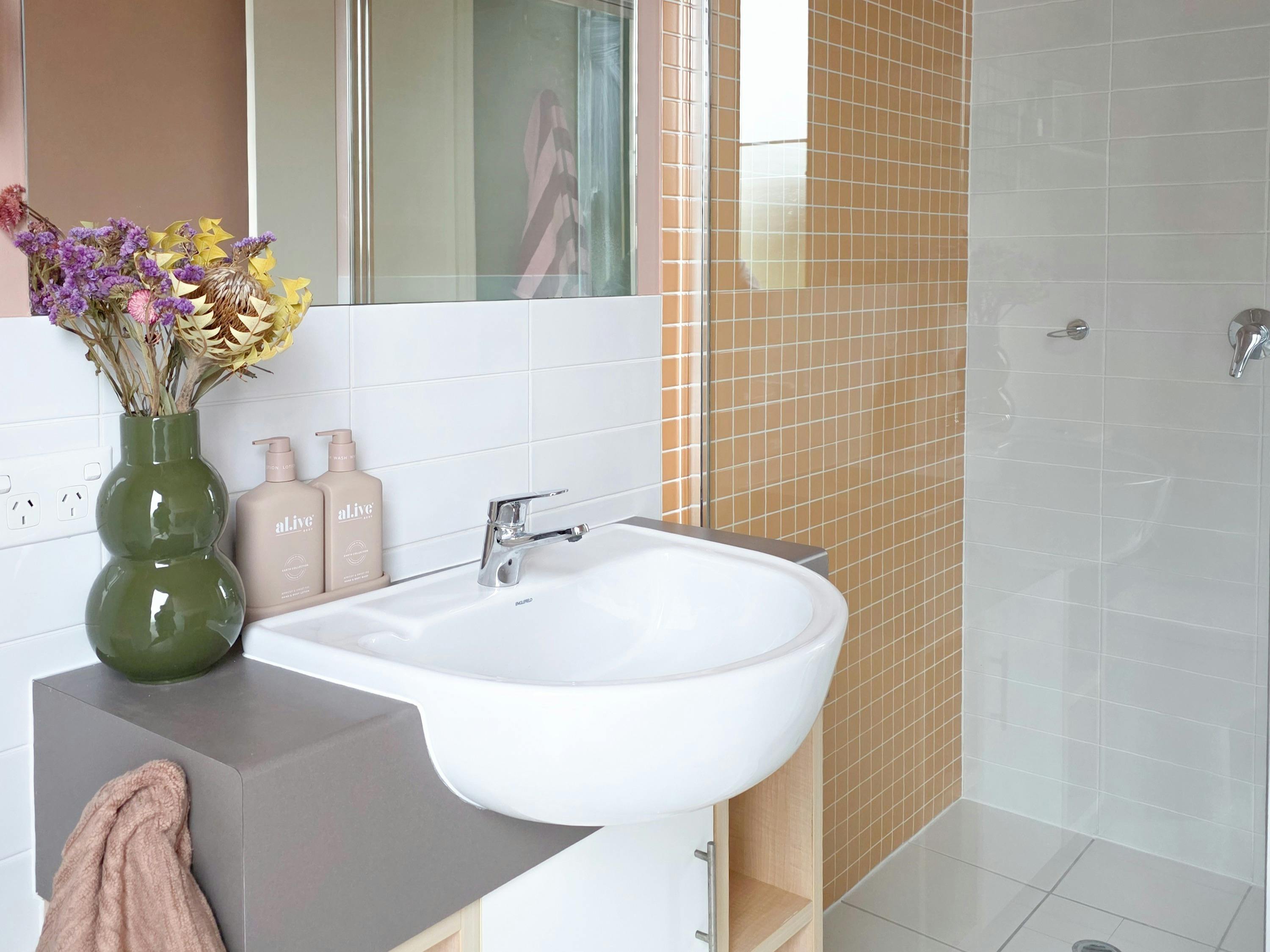 Light-filled colour drenched ensuite with shower, vanity, toilet at Villa 1 by The Shores
