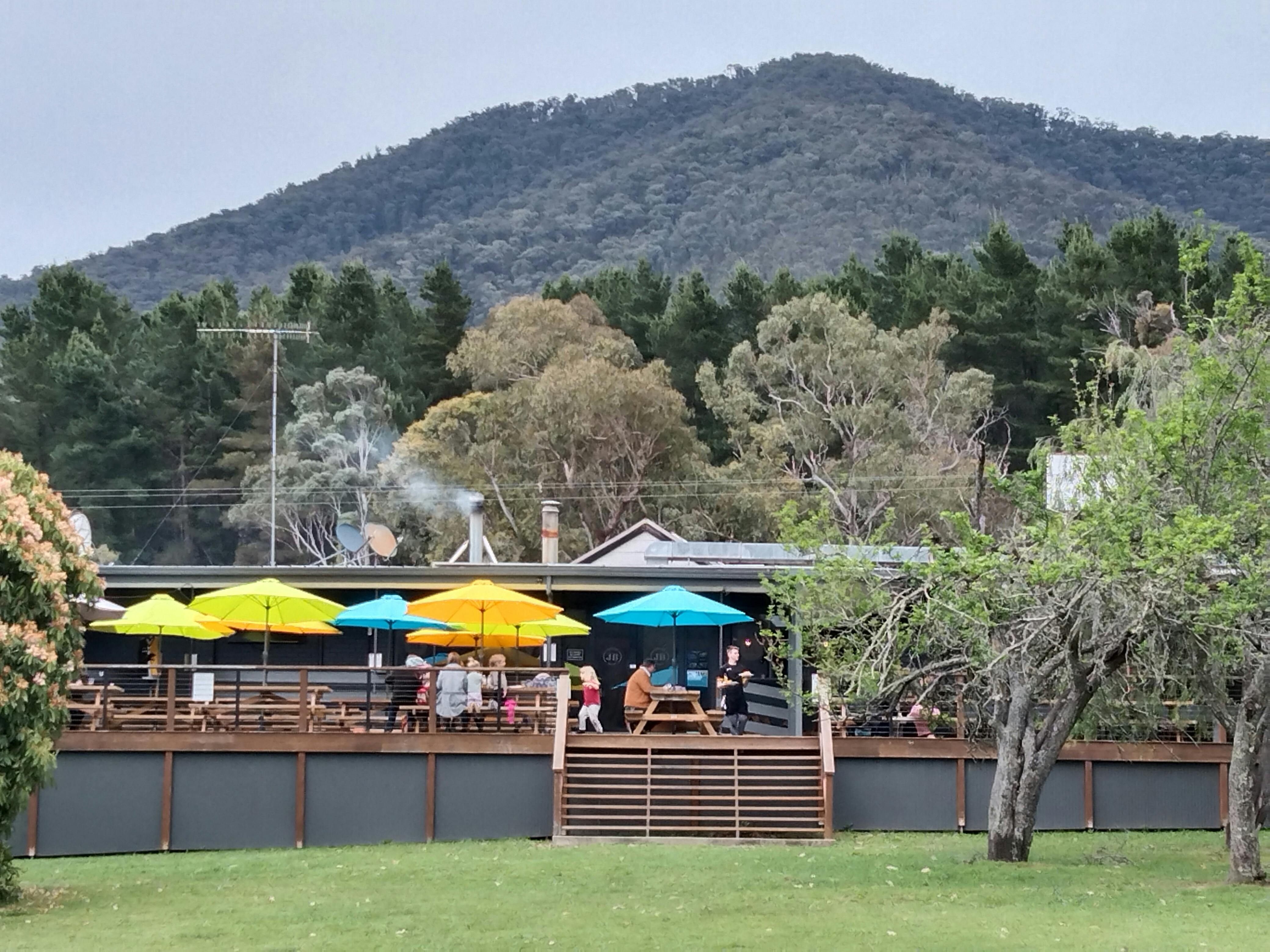 Back decking area showing our colourful umbrellas.