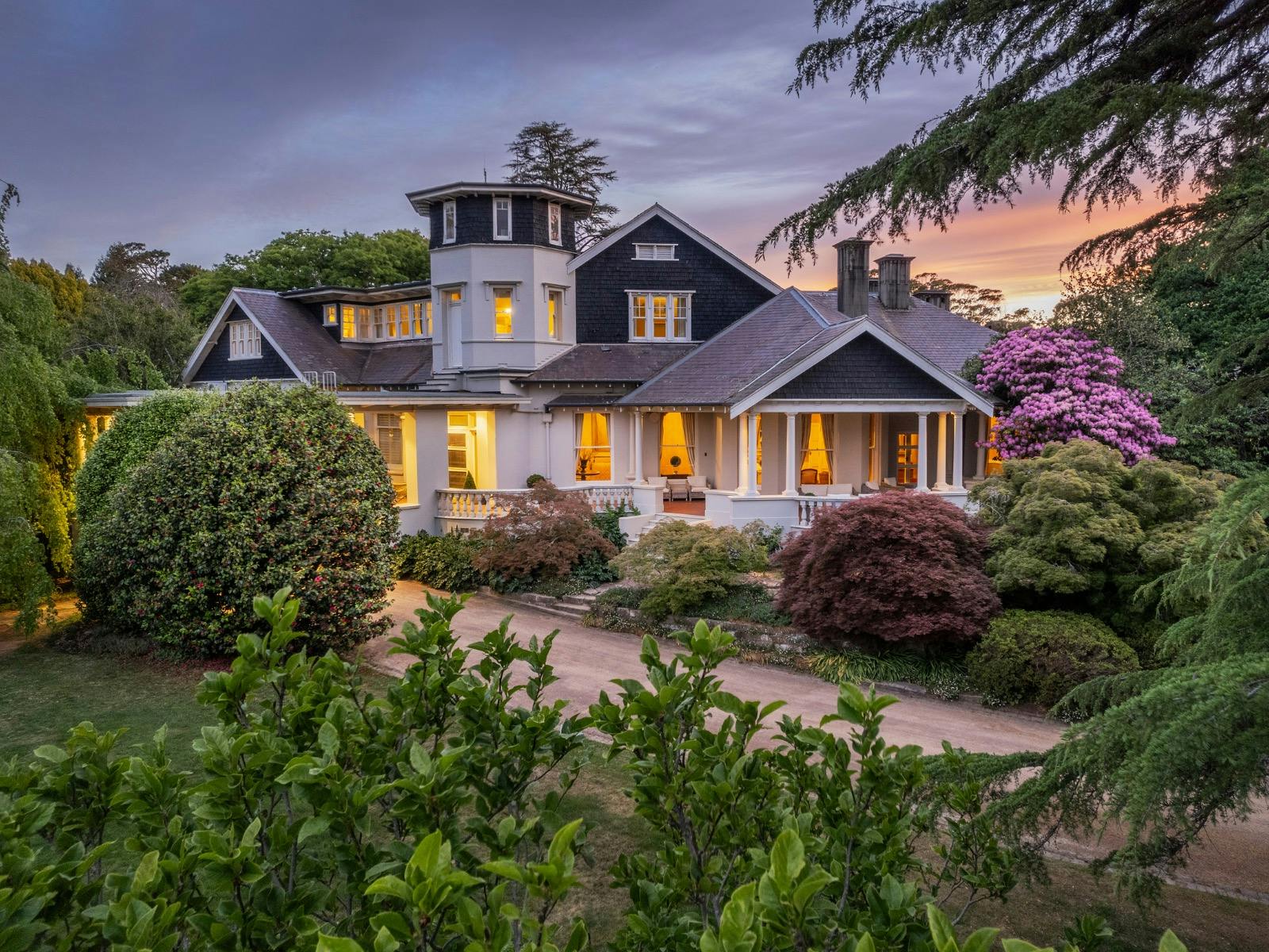 The Milton Park Country House and gardens at dusk.