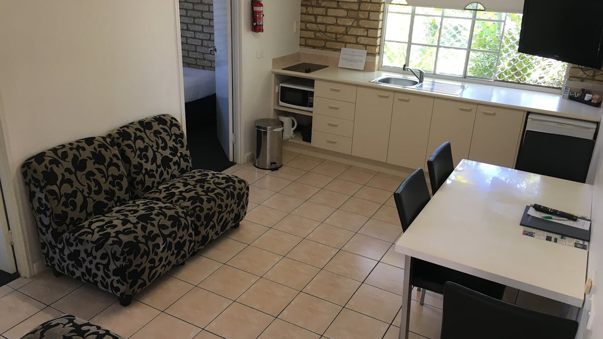 Sitting Area and kitchen with 2 burner cook top.