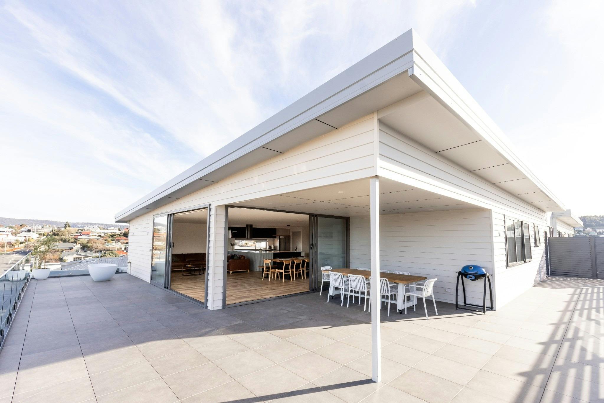 Expansive covered terrace with outdoor dining, barbecue facilities and plenty of space