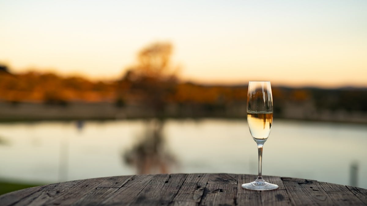 Sparkling Wine at Sunset overlooking the water at Balancing Heart Vineyard