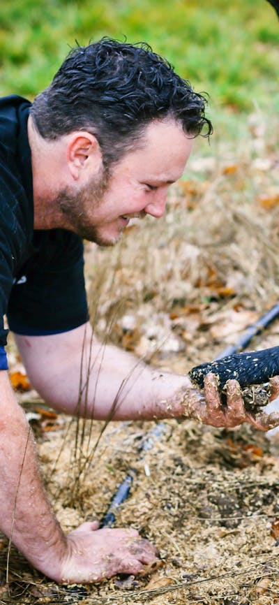 Dog and farmer with the truffle