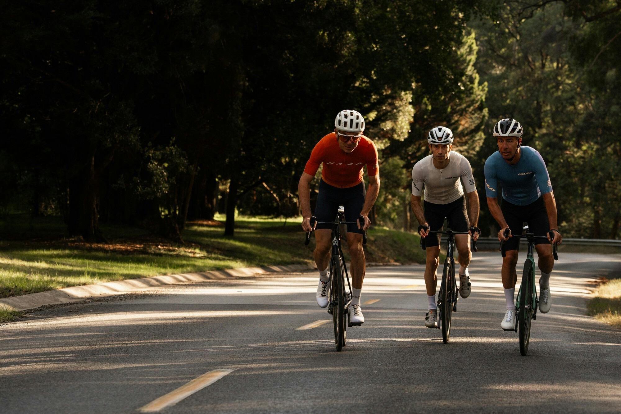 Three cyclists riding up the Mt Hotham 7 Peaks Challenge