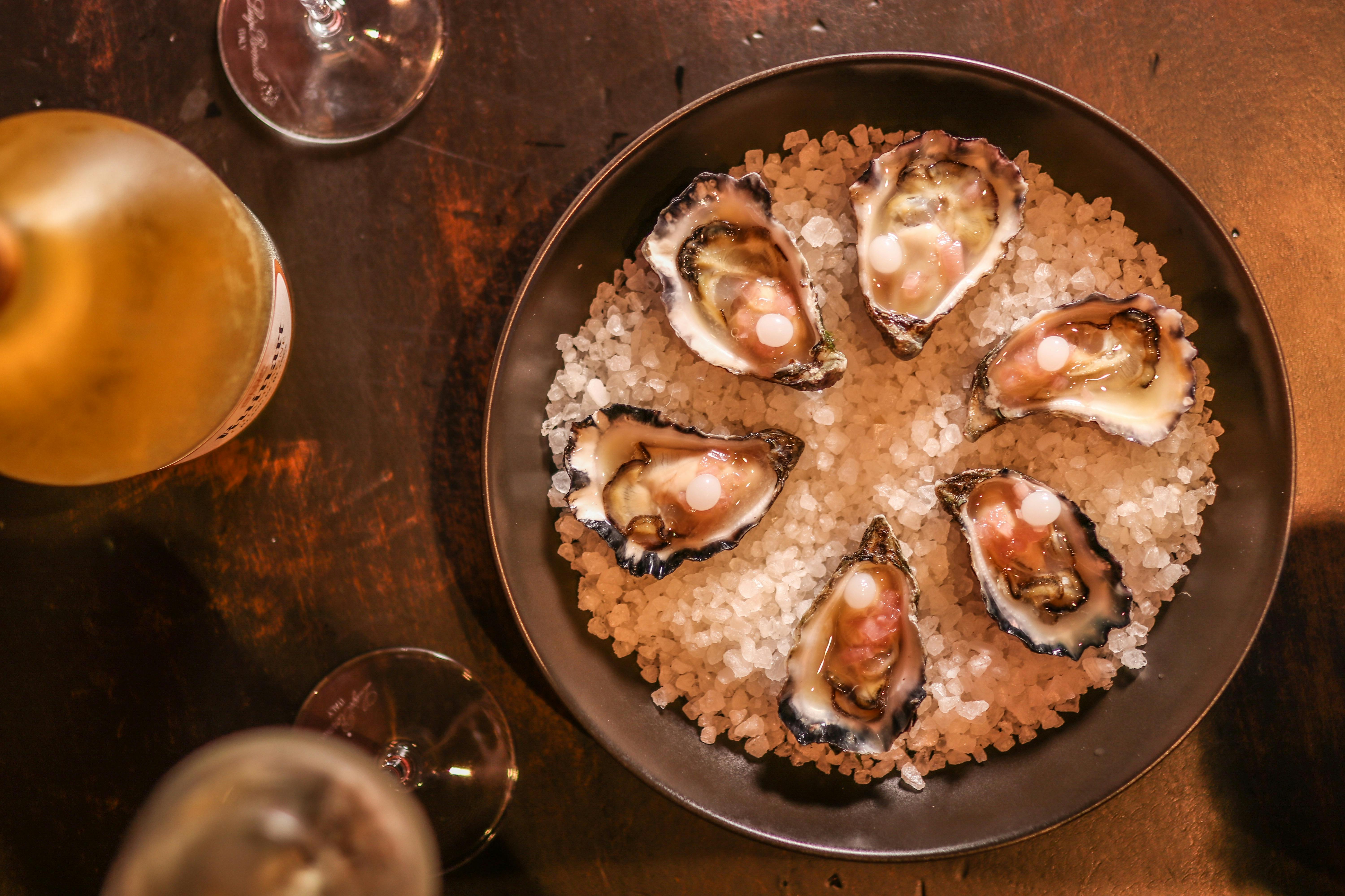 Signature Oysters, Pomegranate Mignonette, Yoghurt Pearl