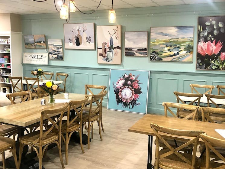 tables and chairs available for sit in customers at Bake, Table & Tea