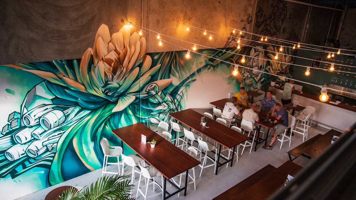 Young Giants Brewing taproom glows with @Sofles’ vibrant mural, where art meets craft beer. Young Giants Brewing taproom glows with @Sofles’ vibrant mural, where art meets craft beer.