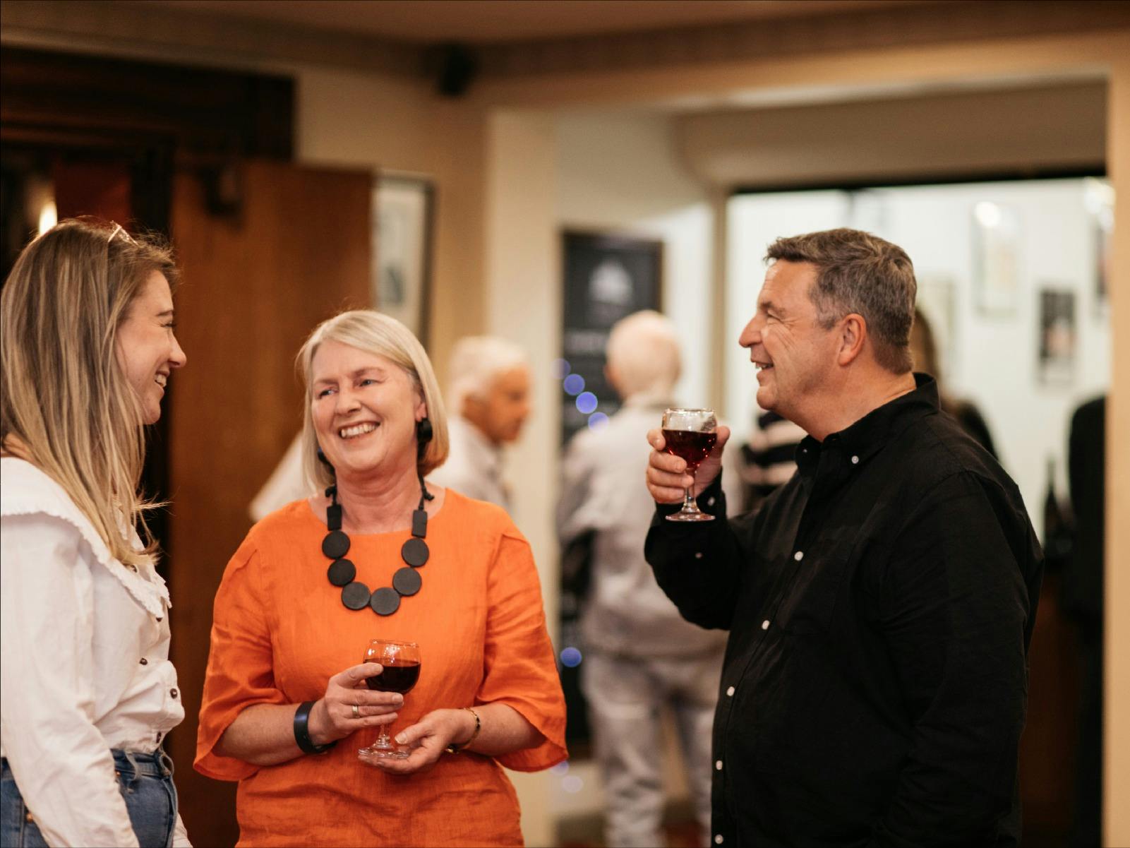 Patrons mingling in the Princess Theatre top foyer