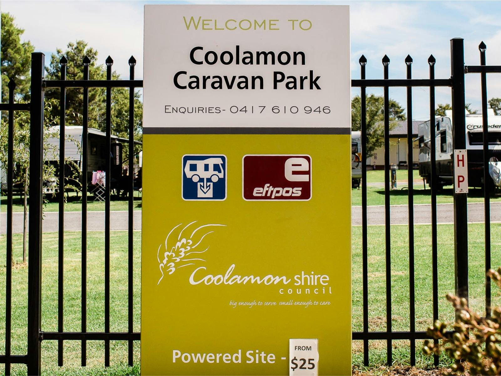 Front entrance with sign to caravan park