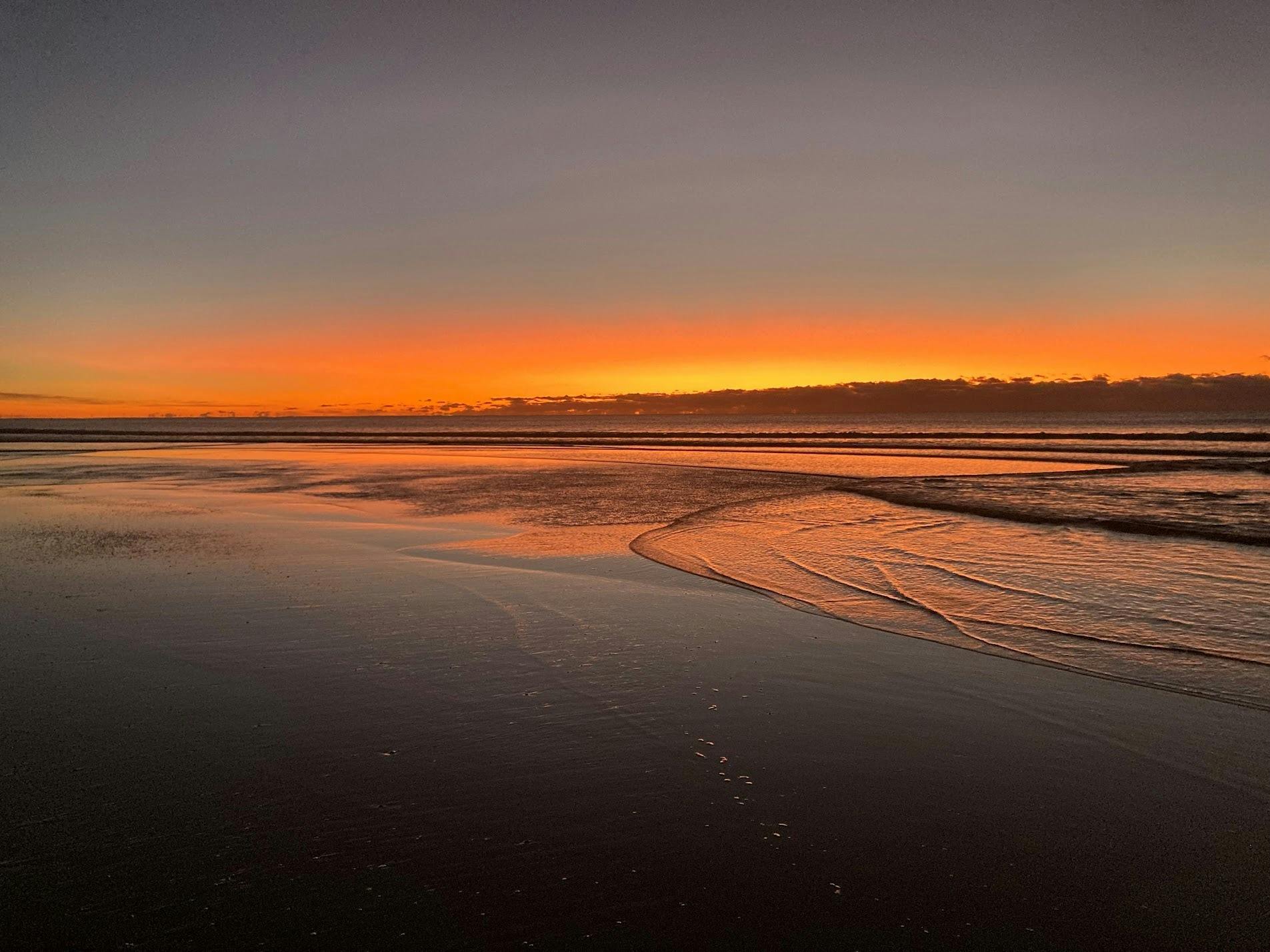 spectacular morning sunrise over the ocean at Simply Barefoot Ocean Wellness.
