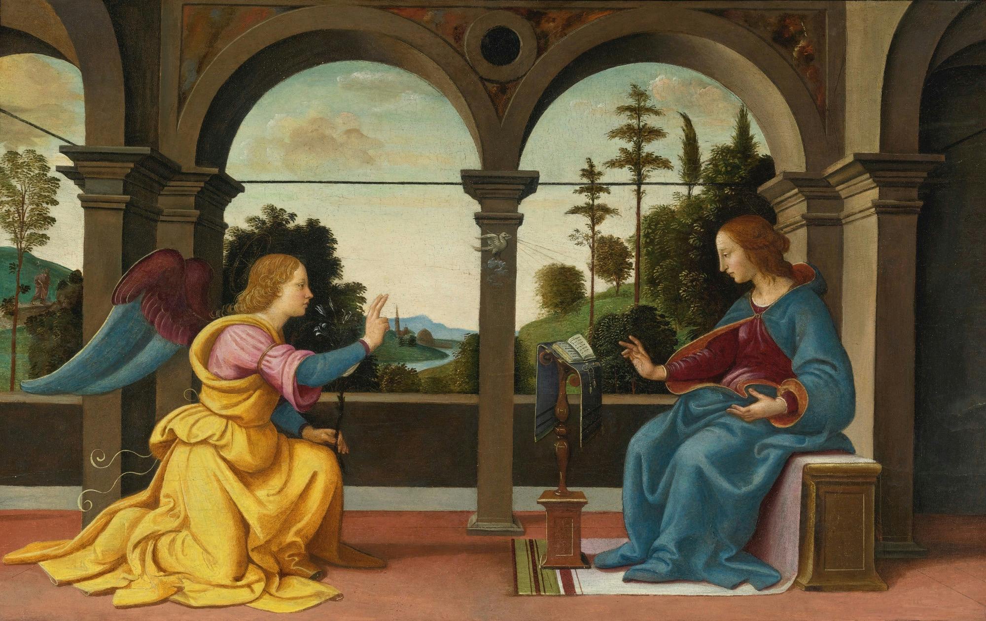 An angel and Mary seated against a simple architectural background