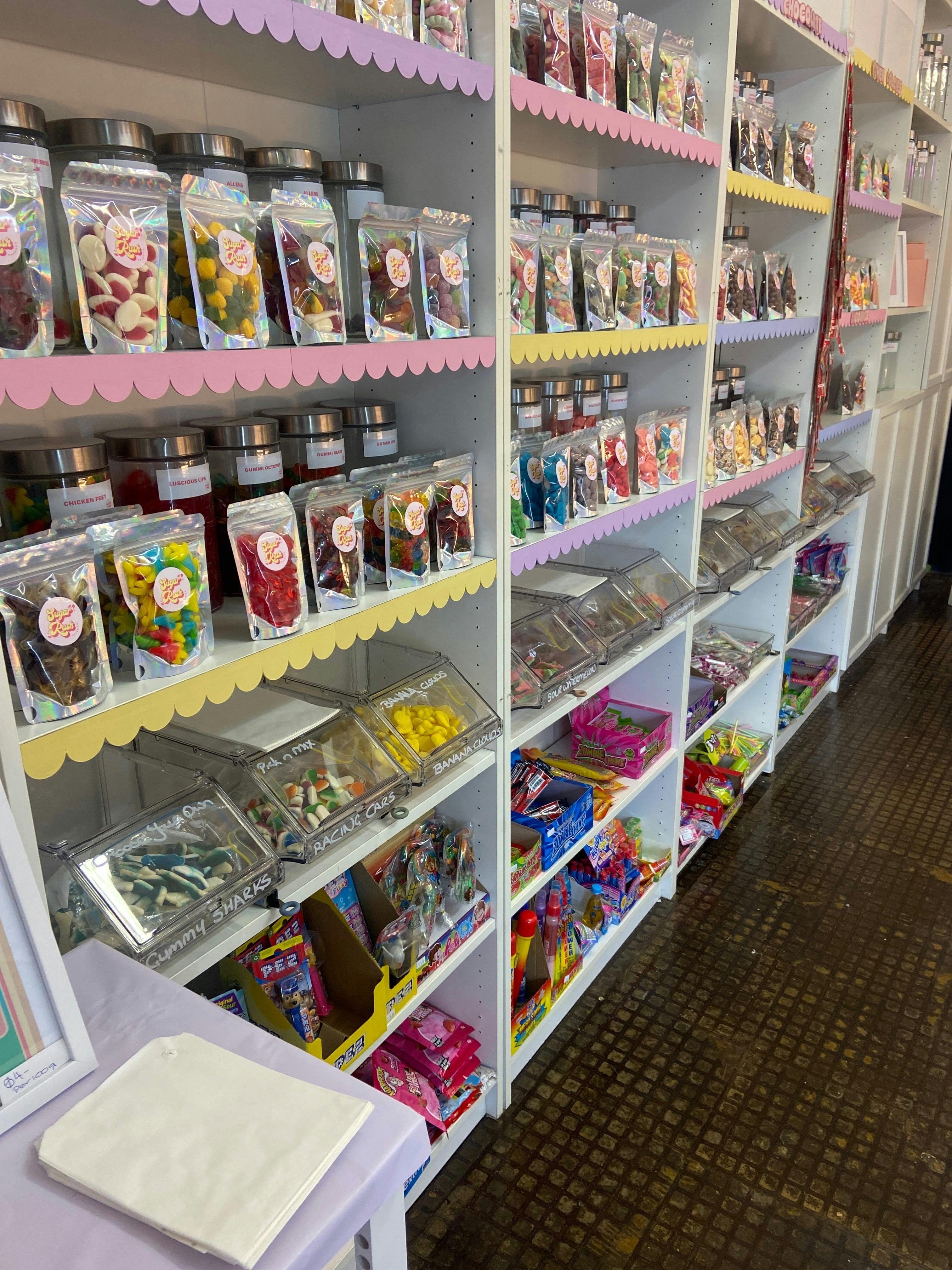 Colourful confectionery shelves inside Sugar Rush Dayboro in Dayboro village.