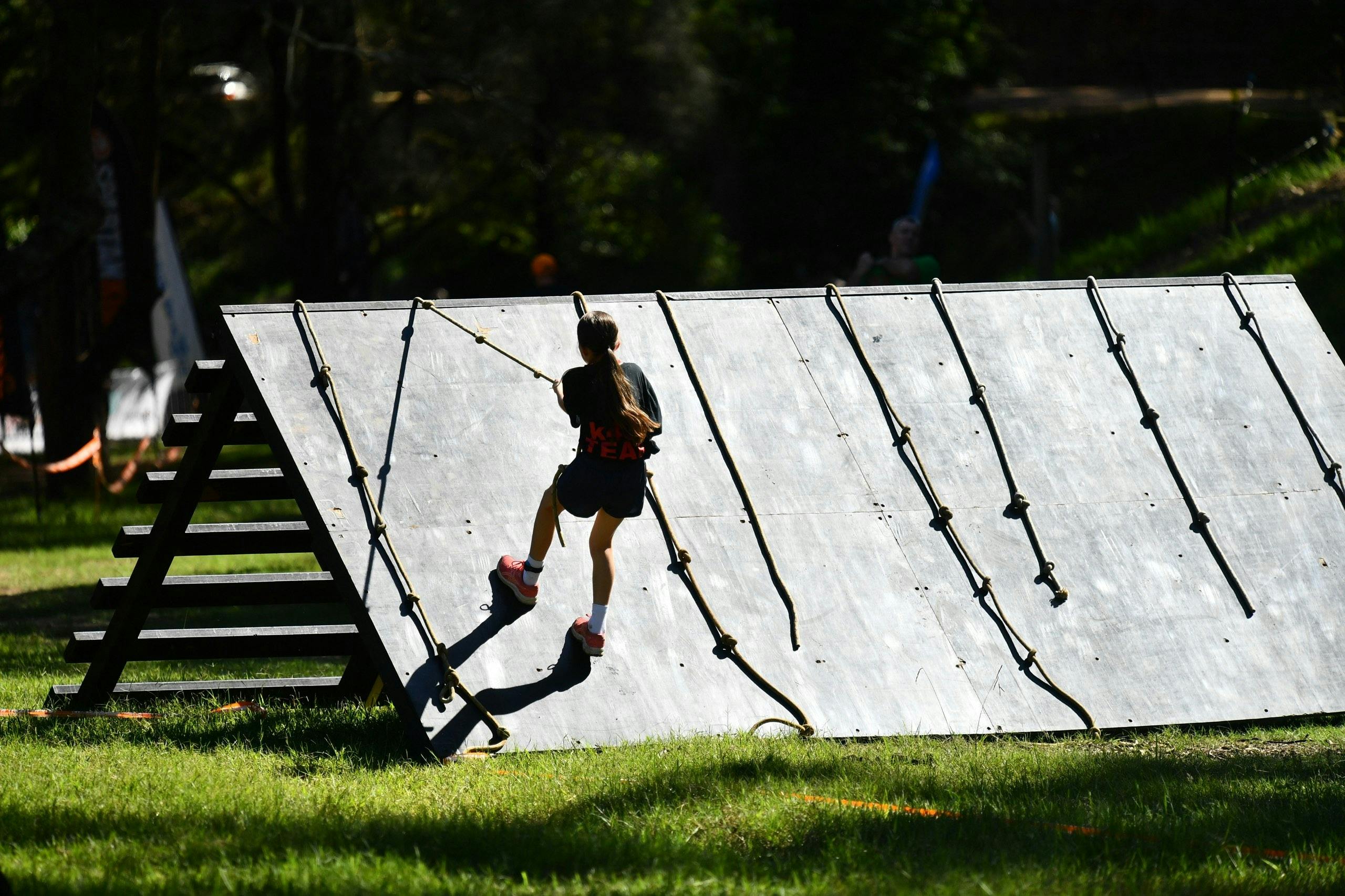 Children doing obstacles