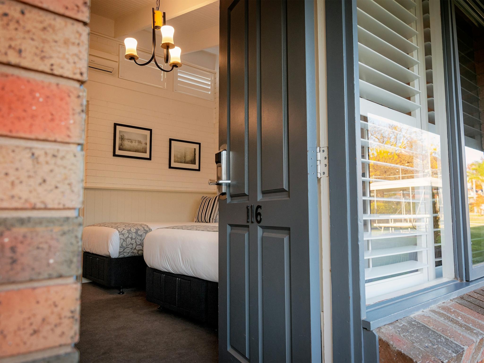 Open door revealing studio apartment at Alzburg Resort