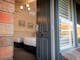 Open door revealing studio apartment at Alzburg Resort