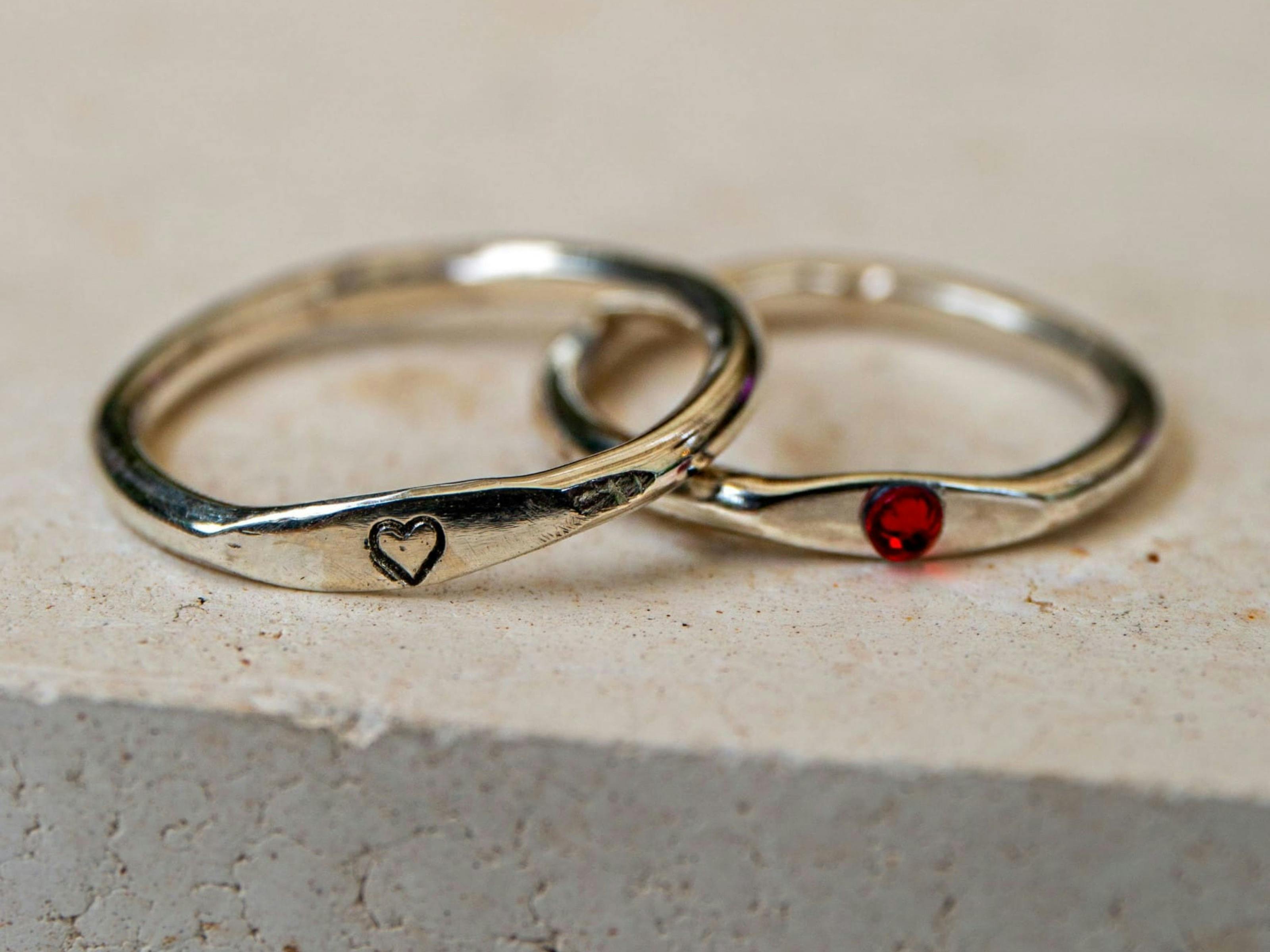 Create your own dainty rounded ring, adding a custom stamp or stone in our ring-making classes.