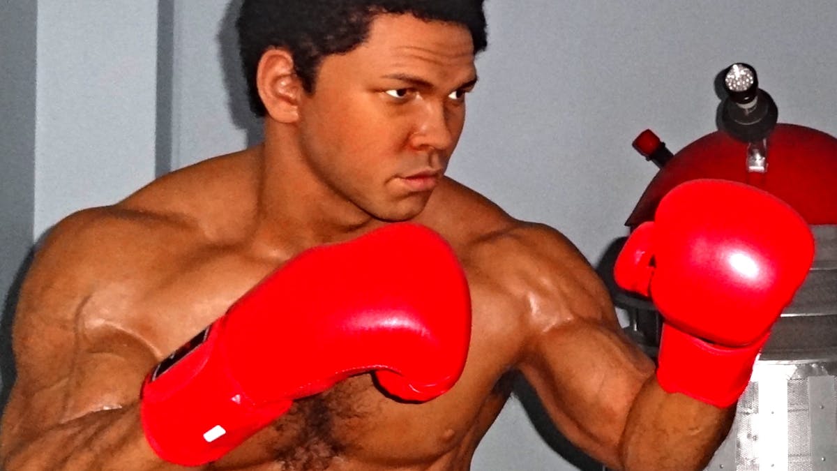Mohammad Ali about to take a punch