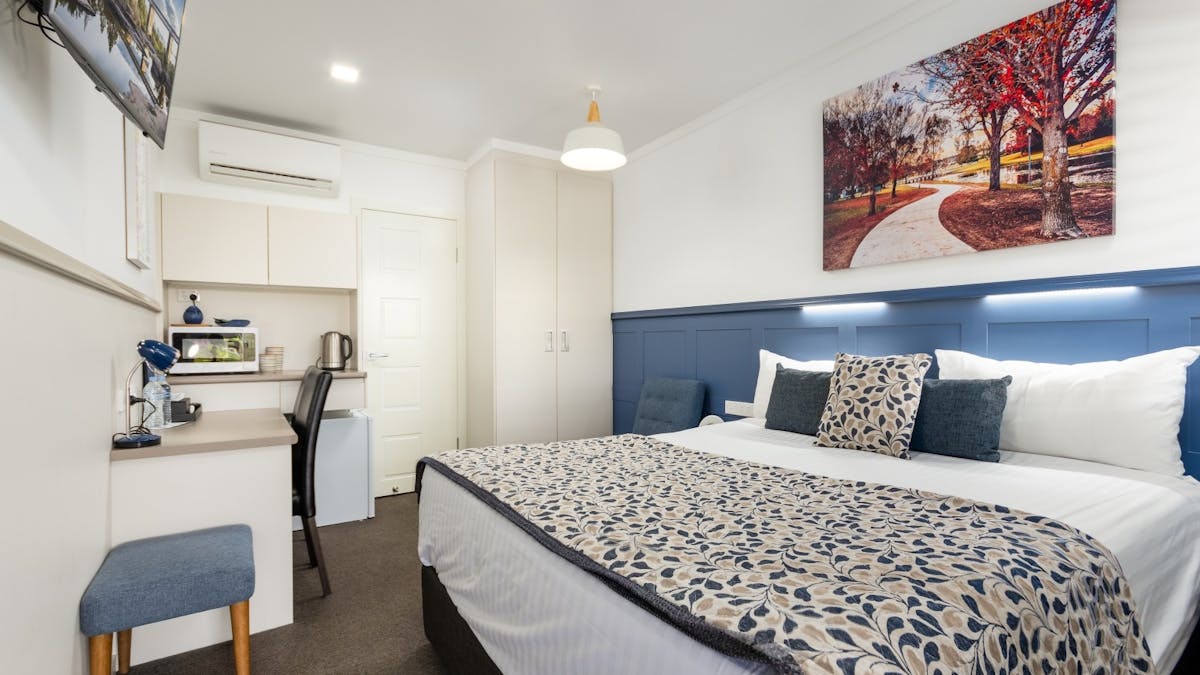 Bedroom in our Deluxe King Rooms