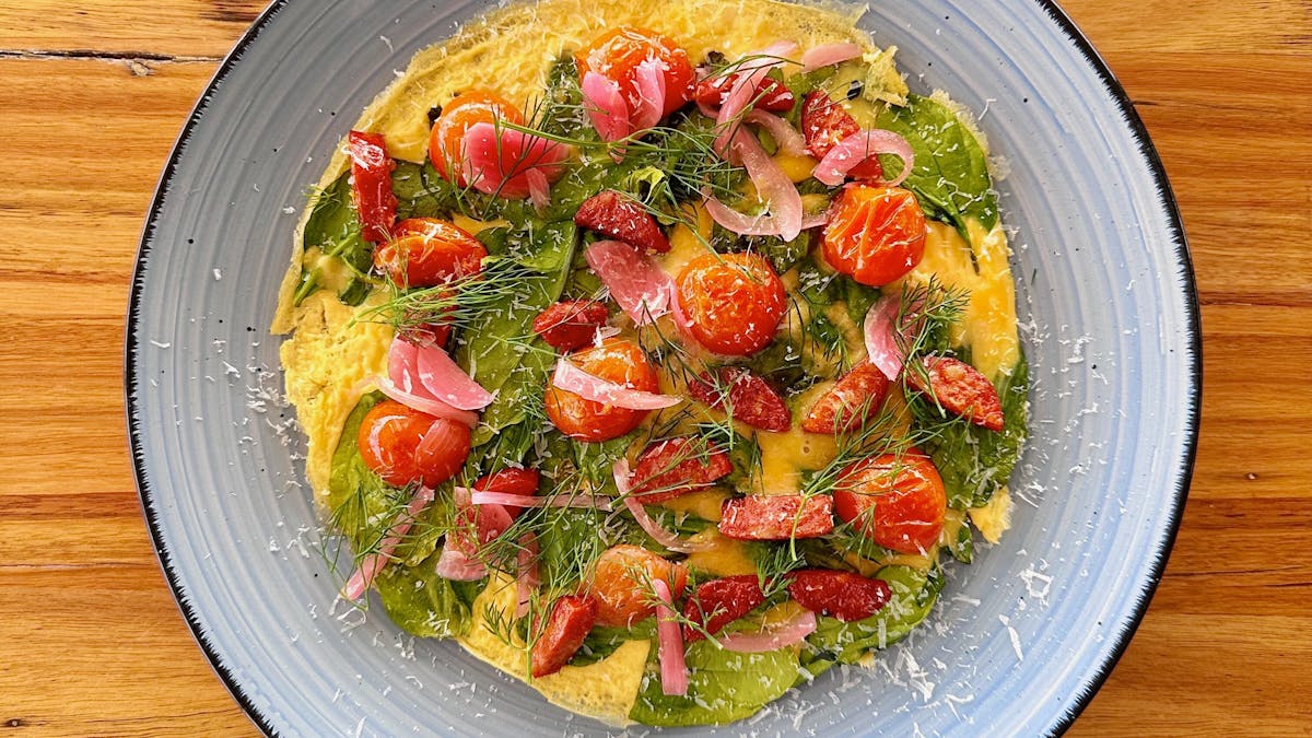 Chorizo omelette, dill, spinach, tomatoes, pickles, parmesan.