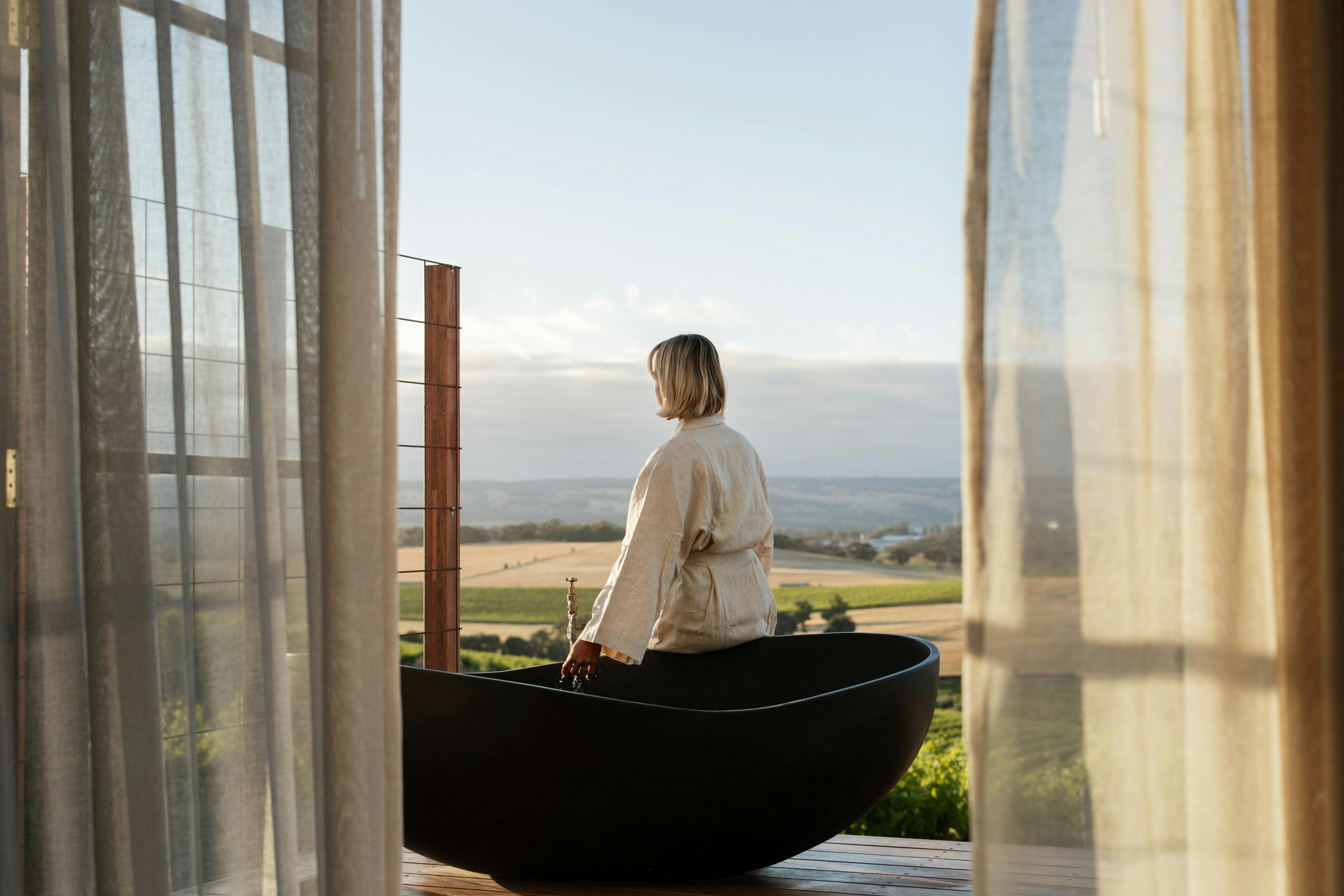 A large stone bath on the deck invites you to watch the world go by.