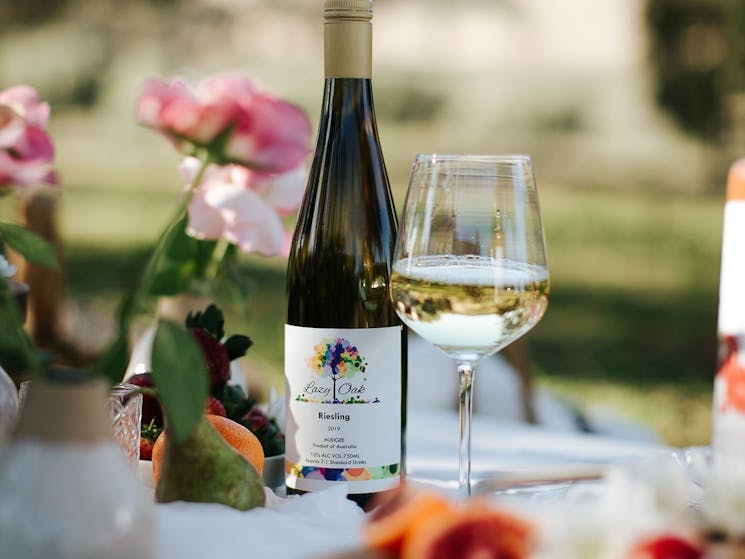 Lazy Oak Riesling on a picnic tables of delicious local food.