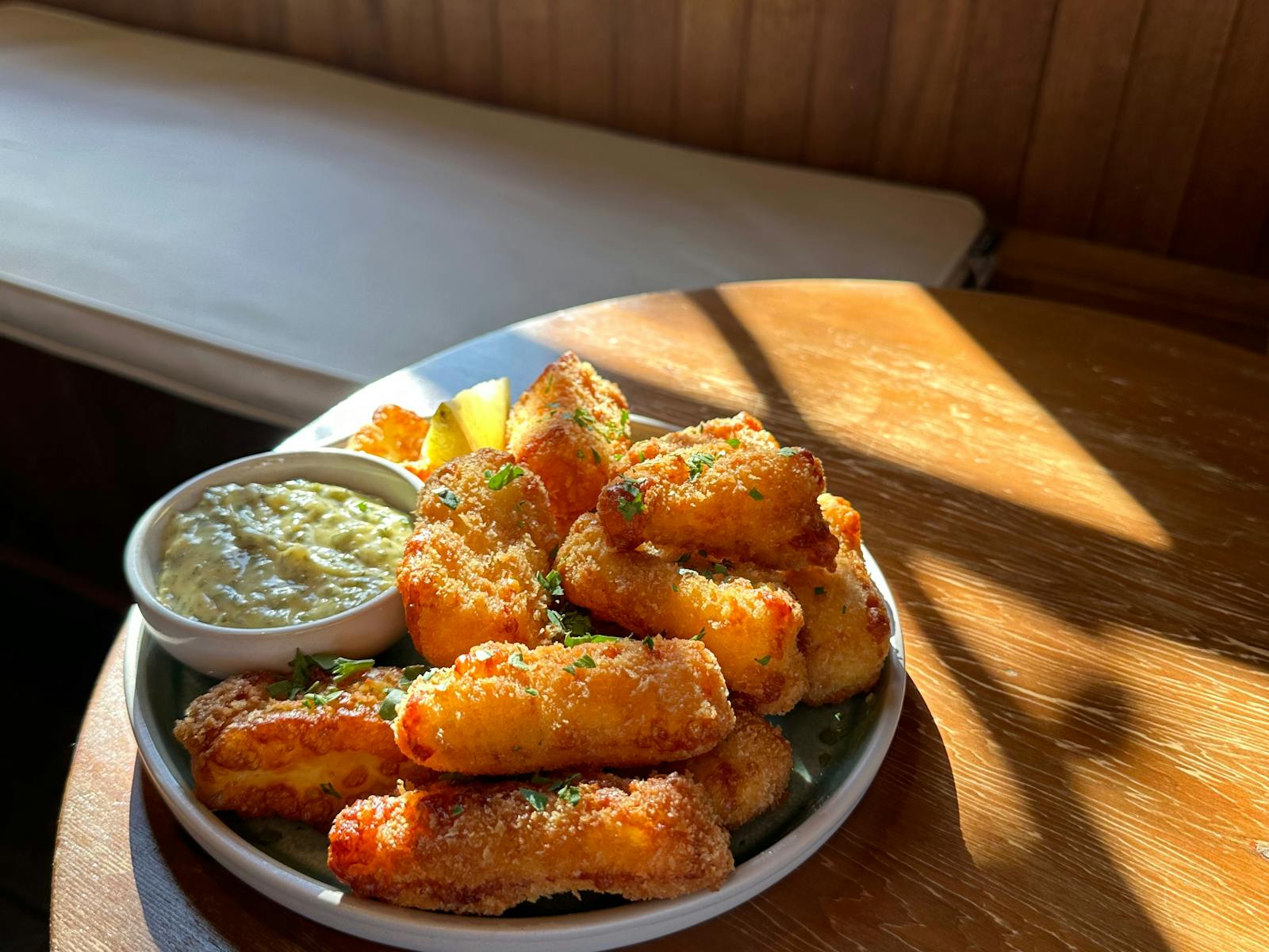 This photo is our halloumi fries and aioli on a plate