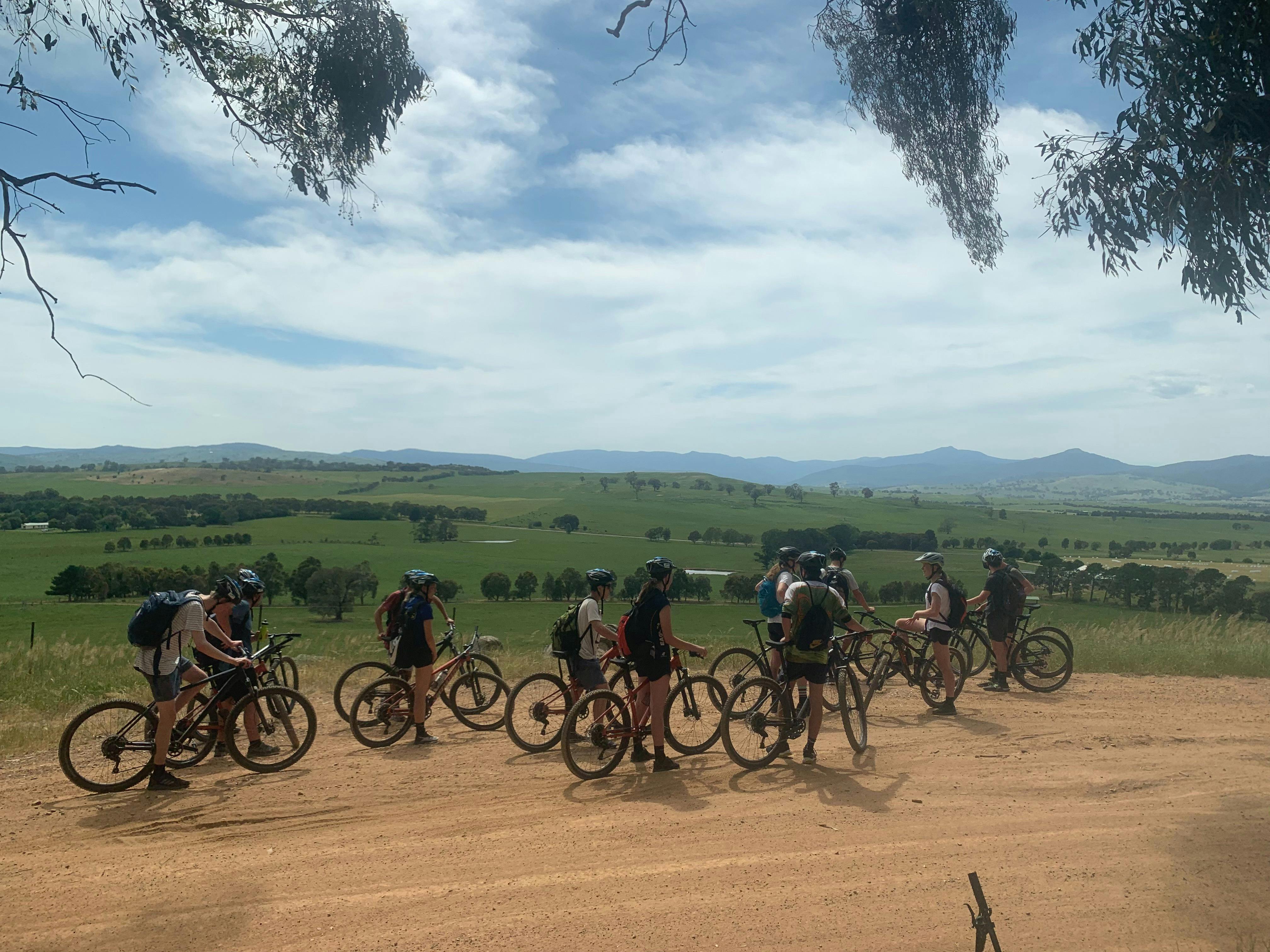 Group riding bikes at Rifle Butts MTB Park