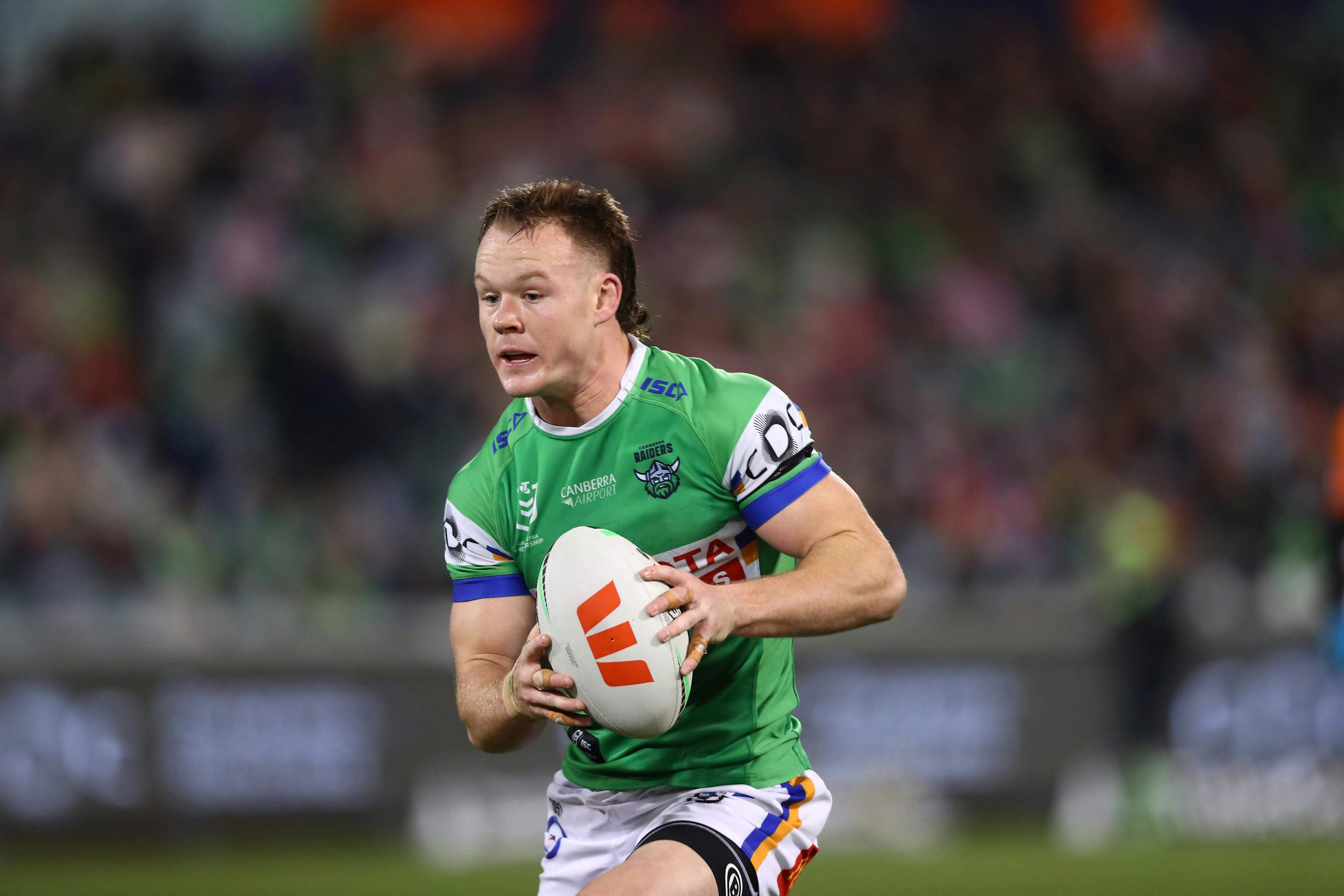 Canberra Raiders player Ethan Strange running the ball.