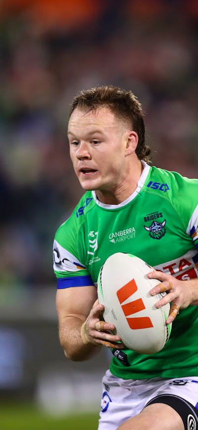 Canberra Raiders player Ethan Strange running the ball.