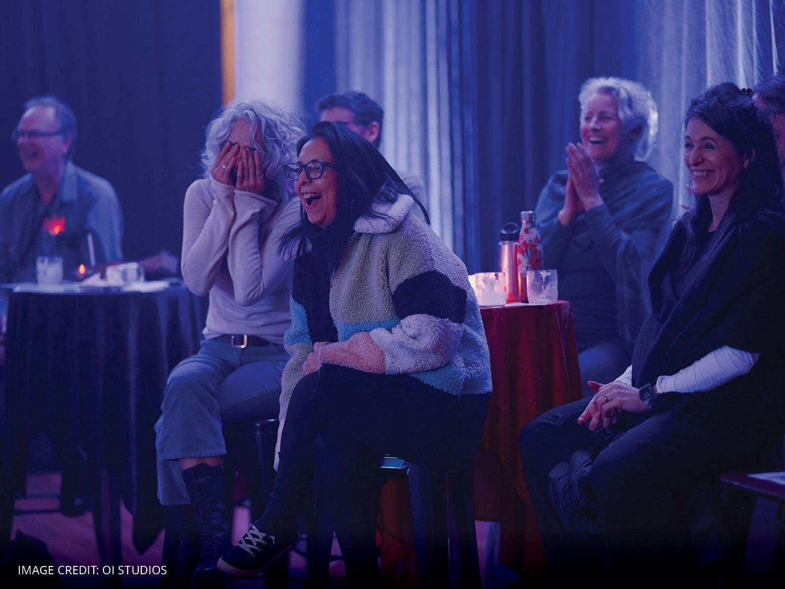 An image of people laughing at a Beaker Street Festival event