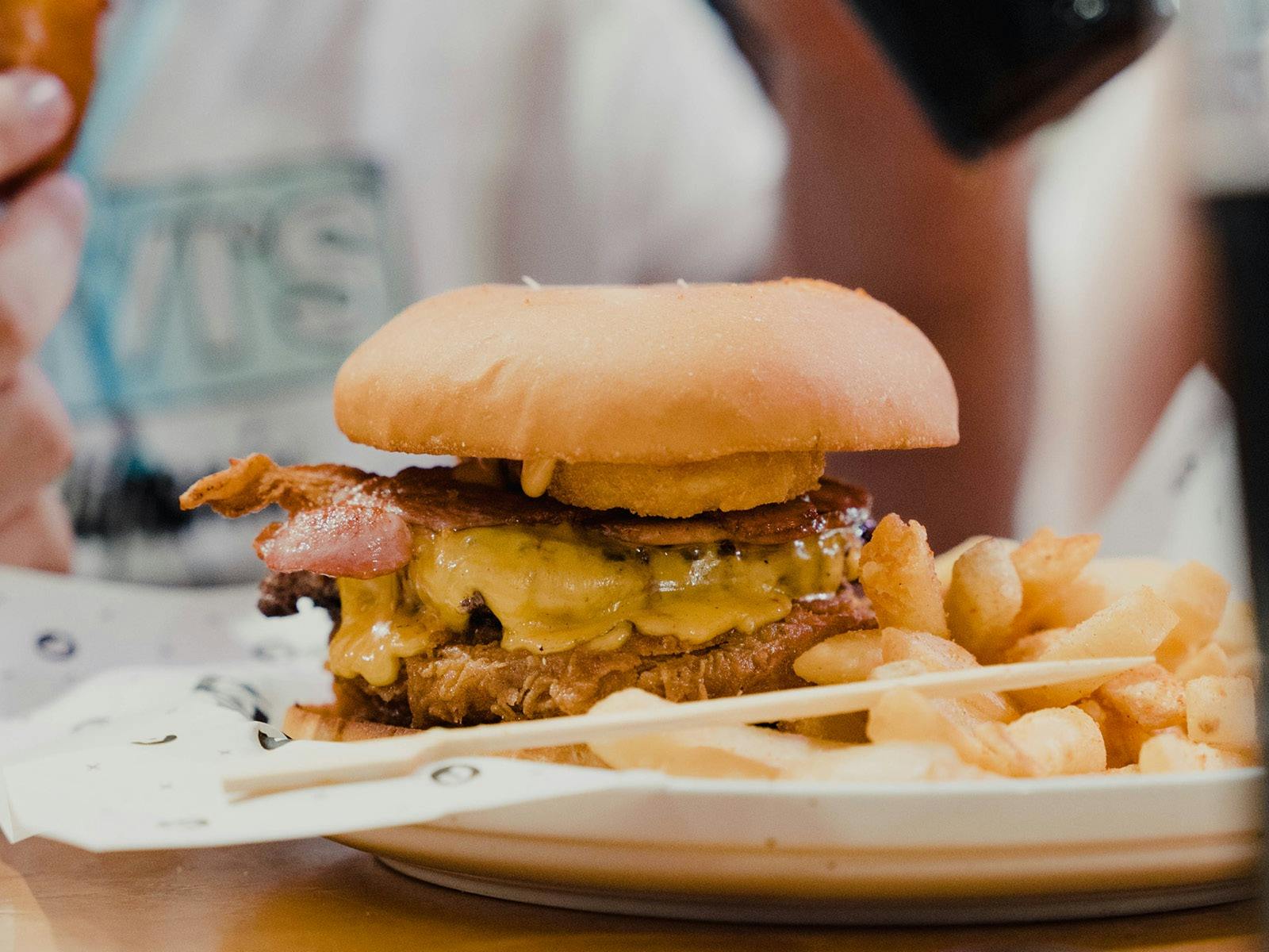 Burger on plate with chips