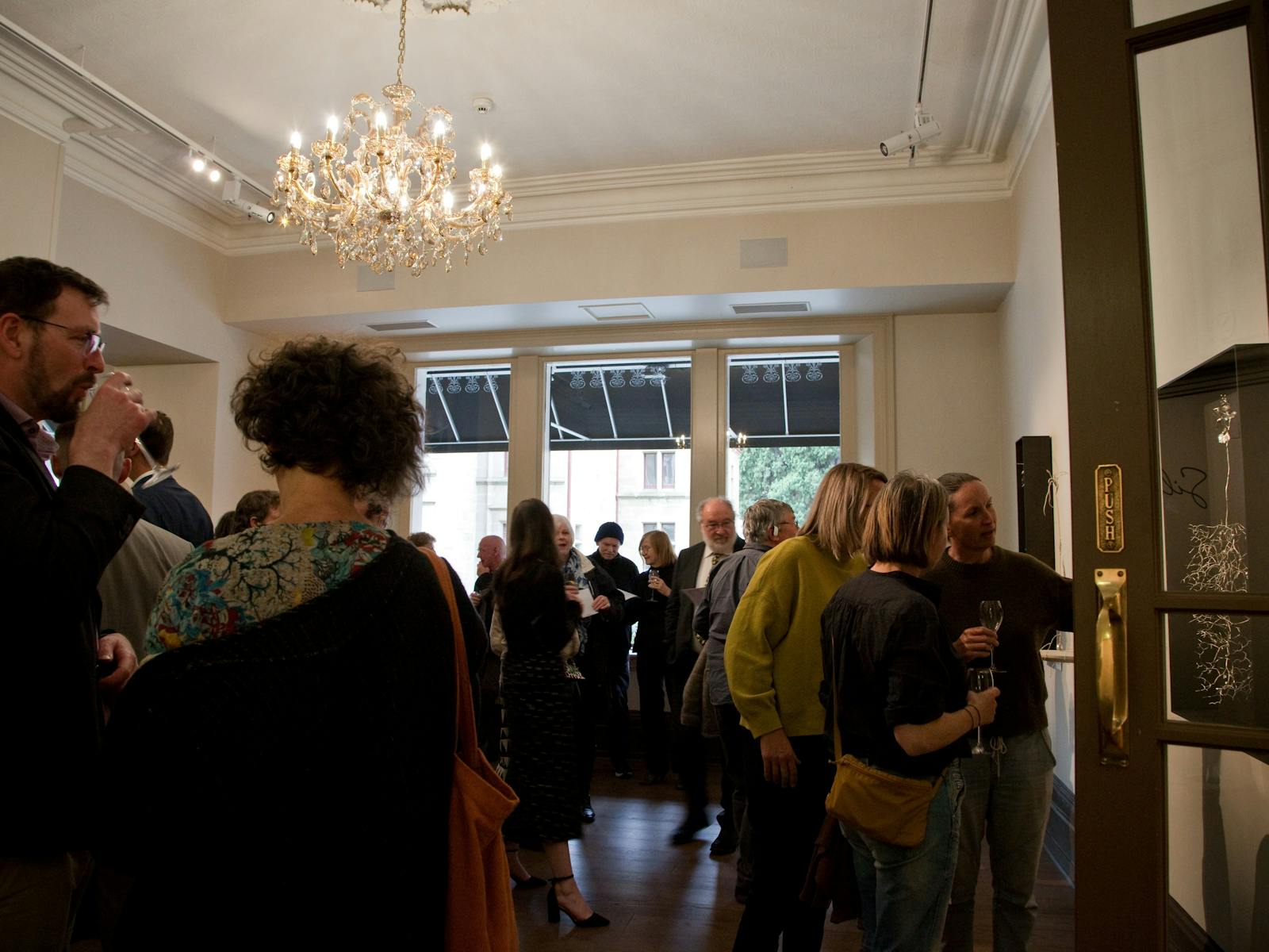 Crowd in Howard Hadley Gallery for Silent Sentinels opening