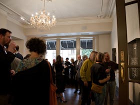 Crowd in Howard Hadley Gallery for Silent Sentinels opening