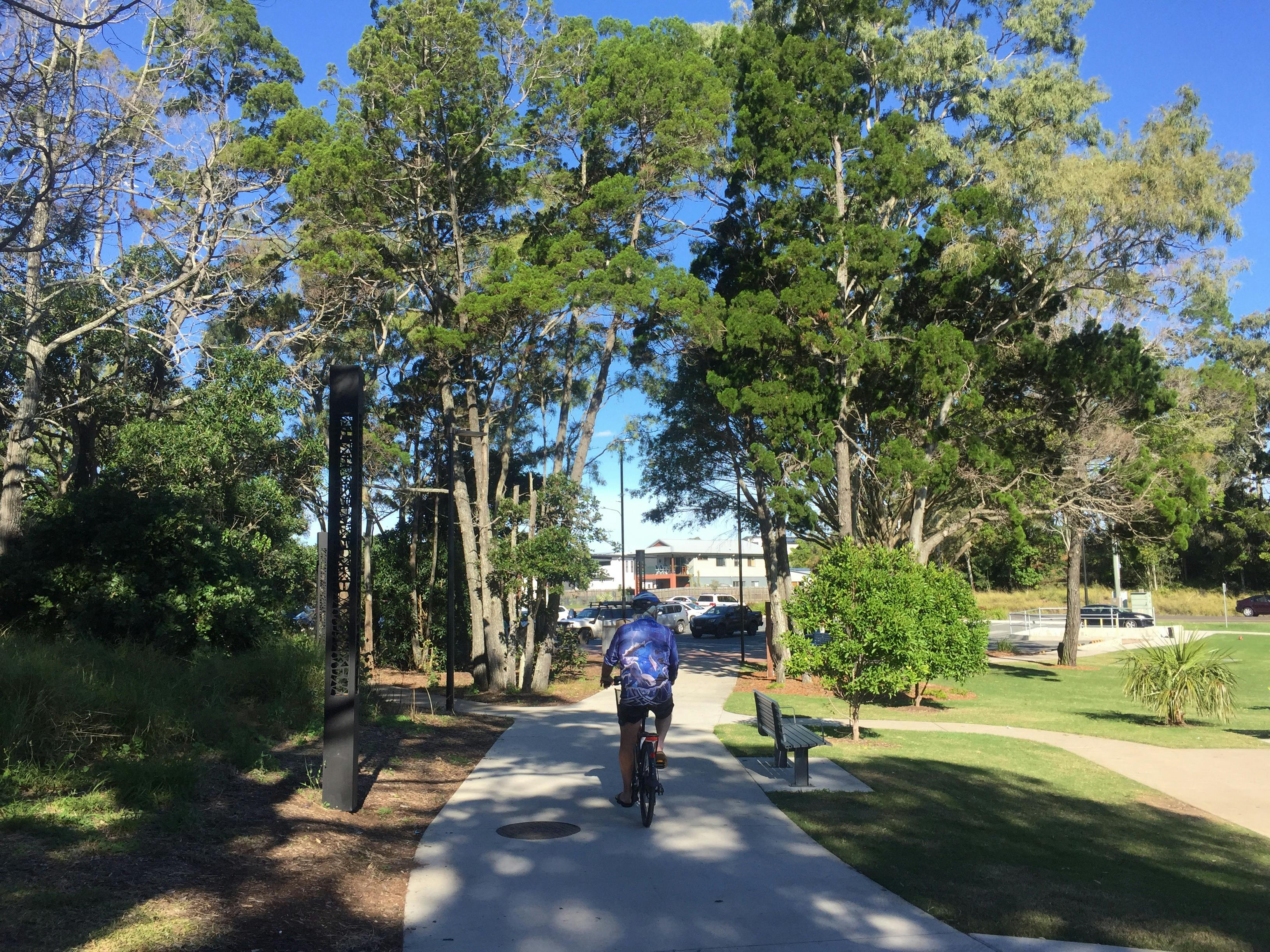 photo of a man riding a bicycle along the shared pathway near Seafront Oval