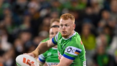 Canberra Raiders player Corey Horsburgh passing the ball.