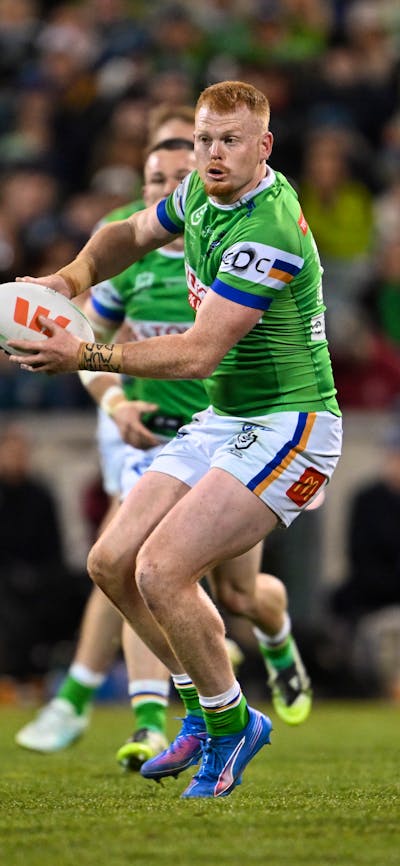 Canberra Raiders player Corey Horsburgh passing the ball.