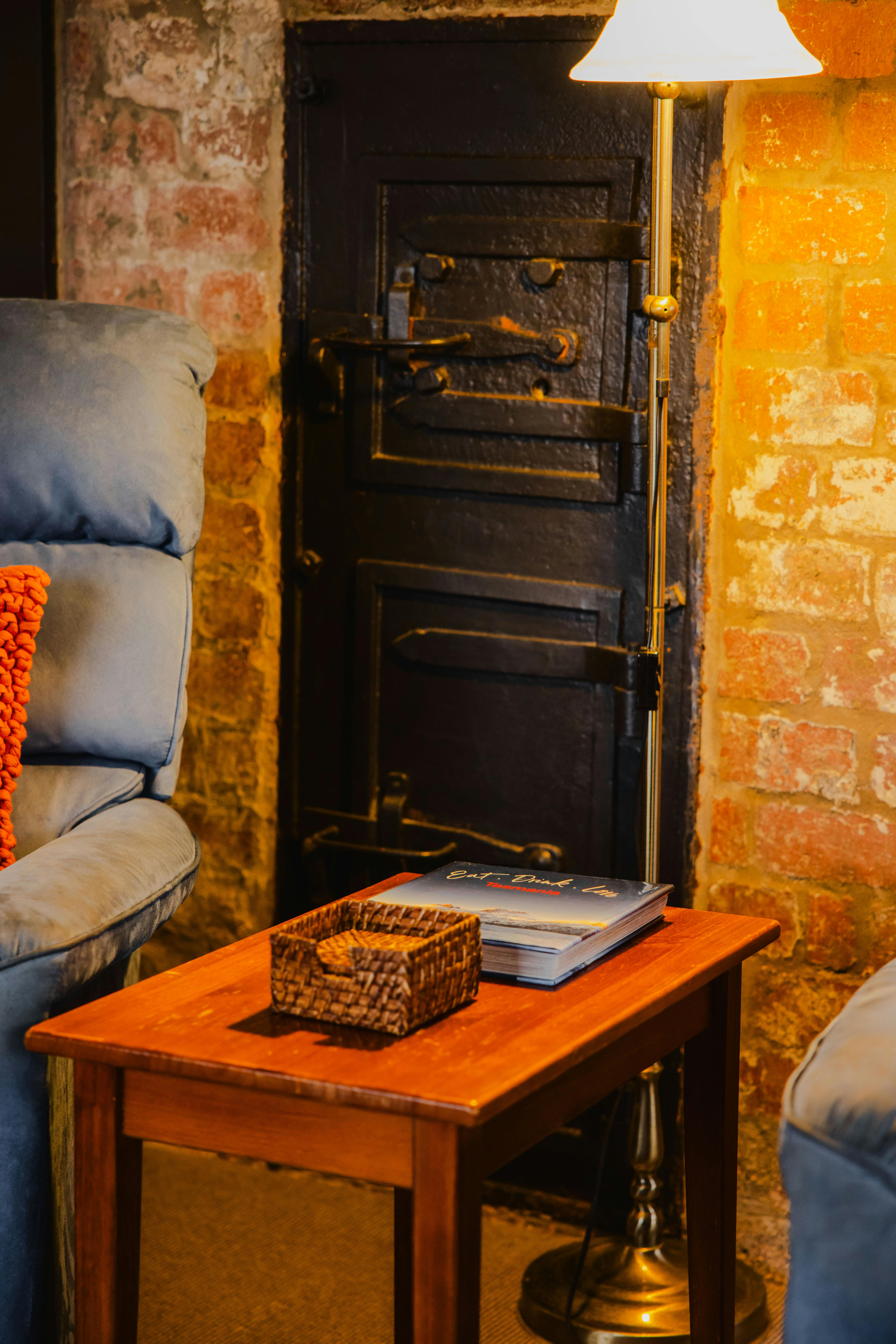comfy armchairs framed from the original bakers oven, Abbey's the Bakery