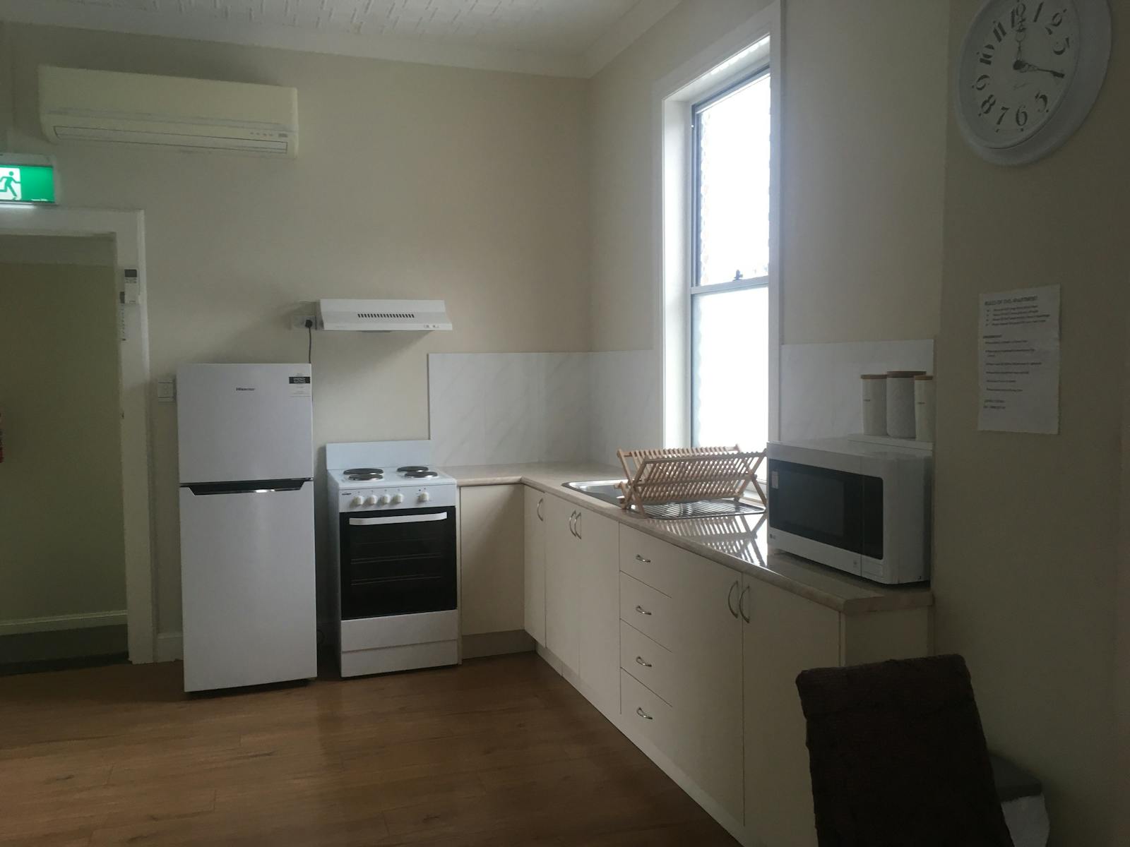 Kitchen with Electric Stove & Refrigerator