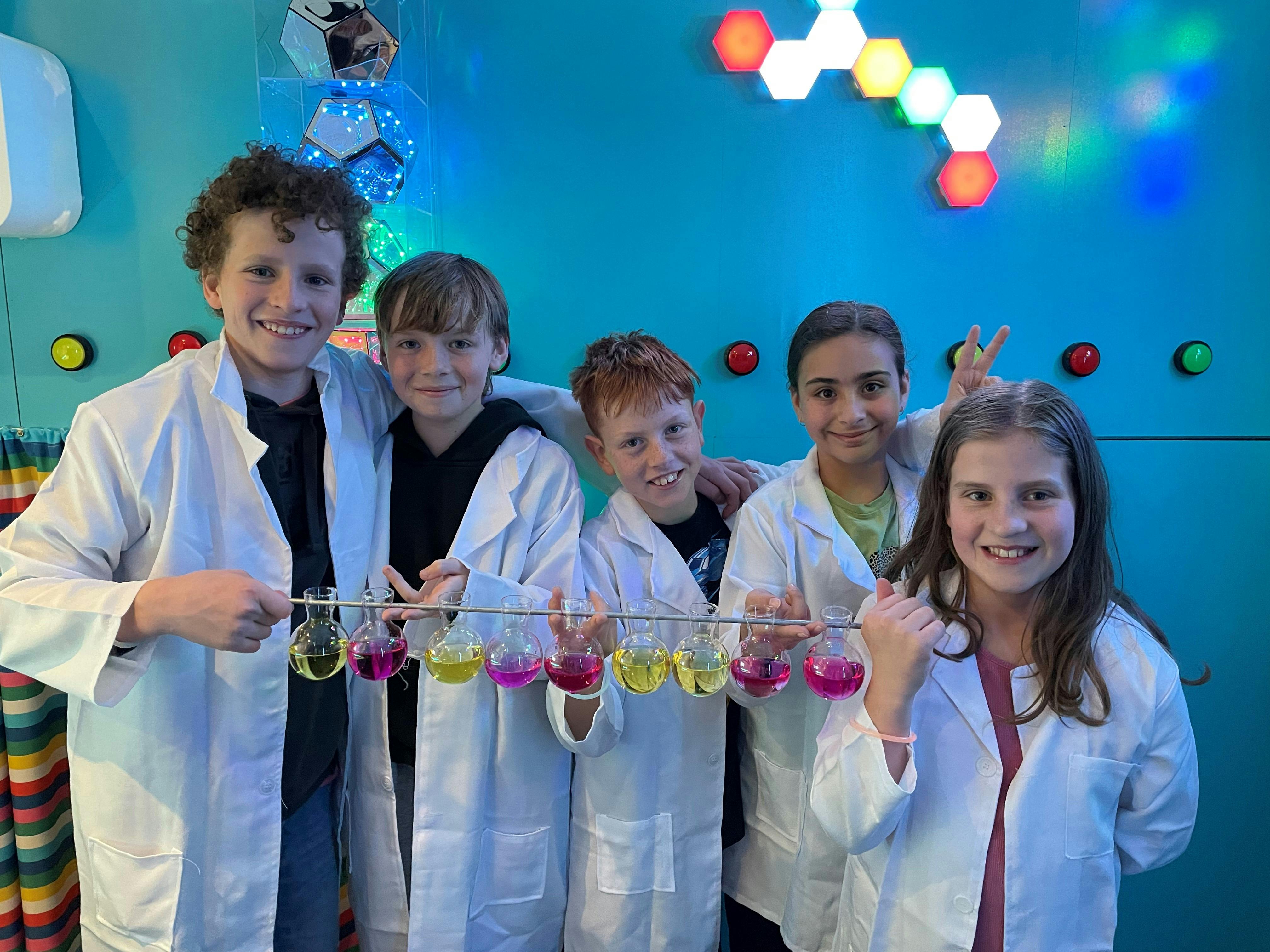 Children playing the mad scientist escape room