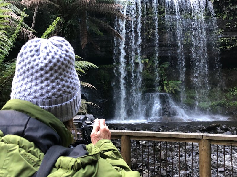 image of tourist and Russell Falls