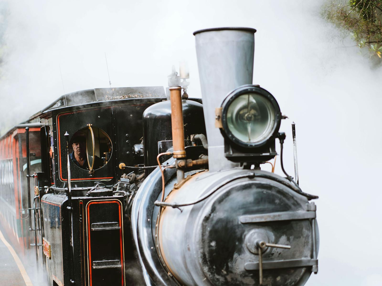 A steam loco departs Lynchford Station