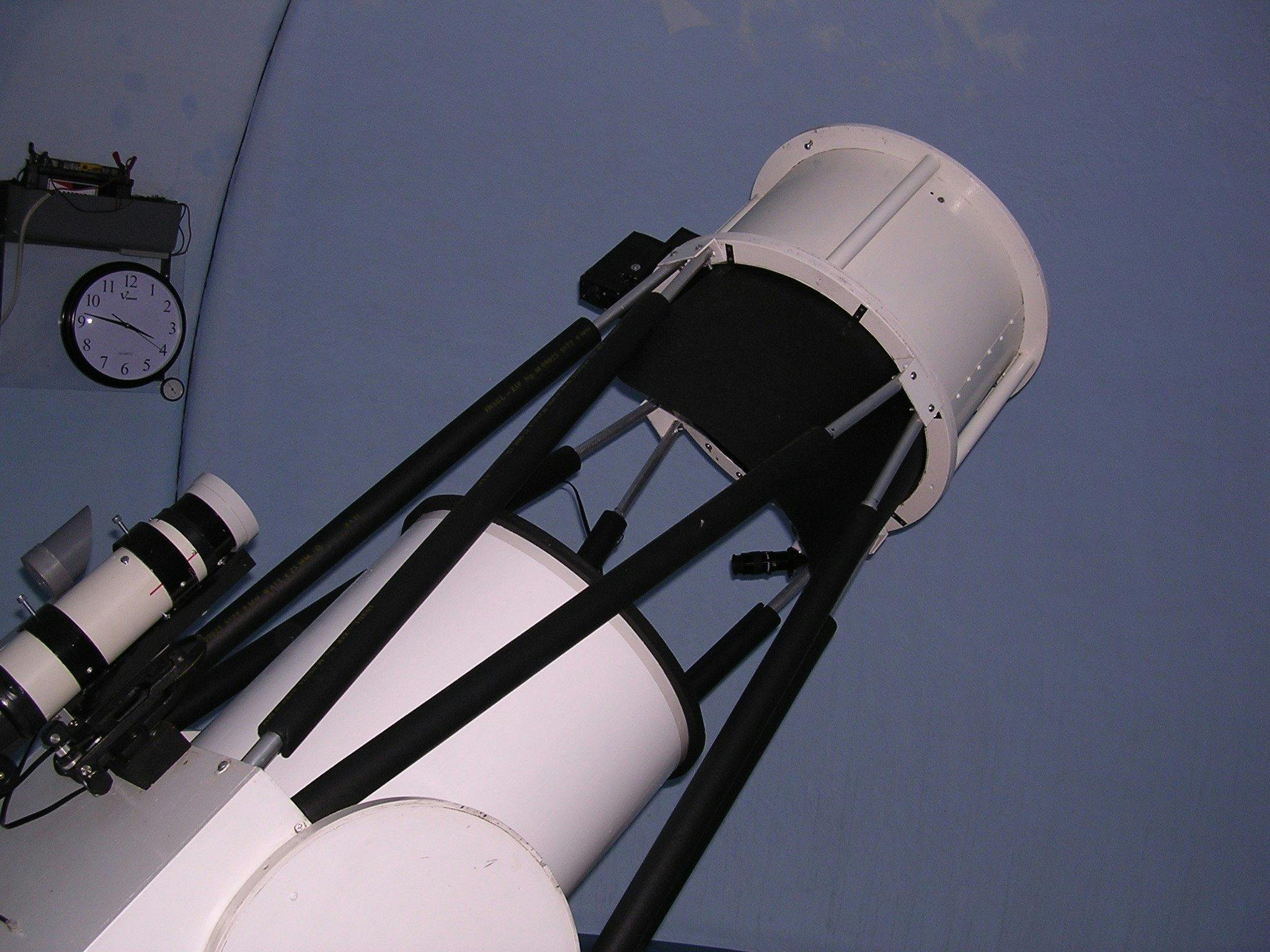 A large telescope is used for the guided night sky tour.