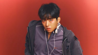 Photo of KINKY with a red background