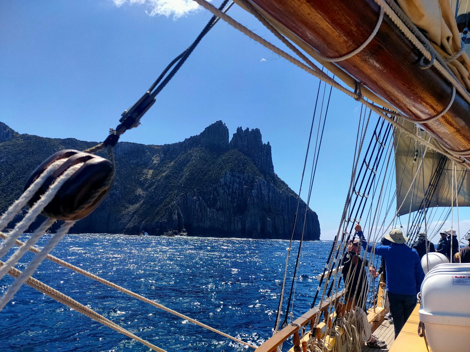 Out at sea looking back to the South Eastern Tasmanian coastline