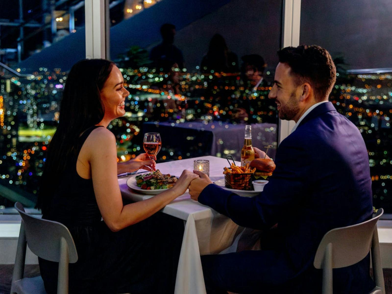 A couple with the view at SkyPoint