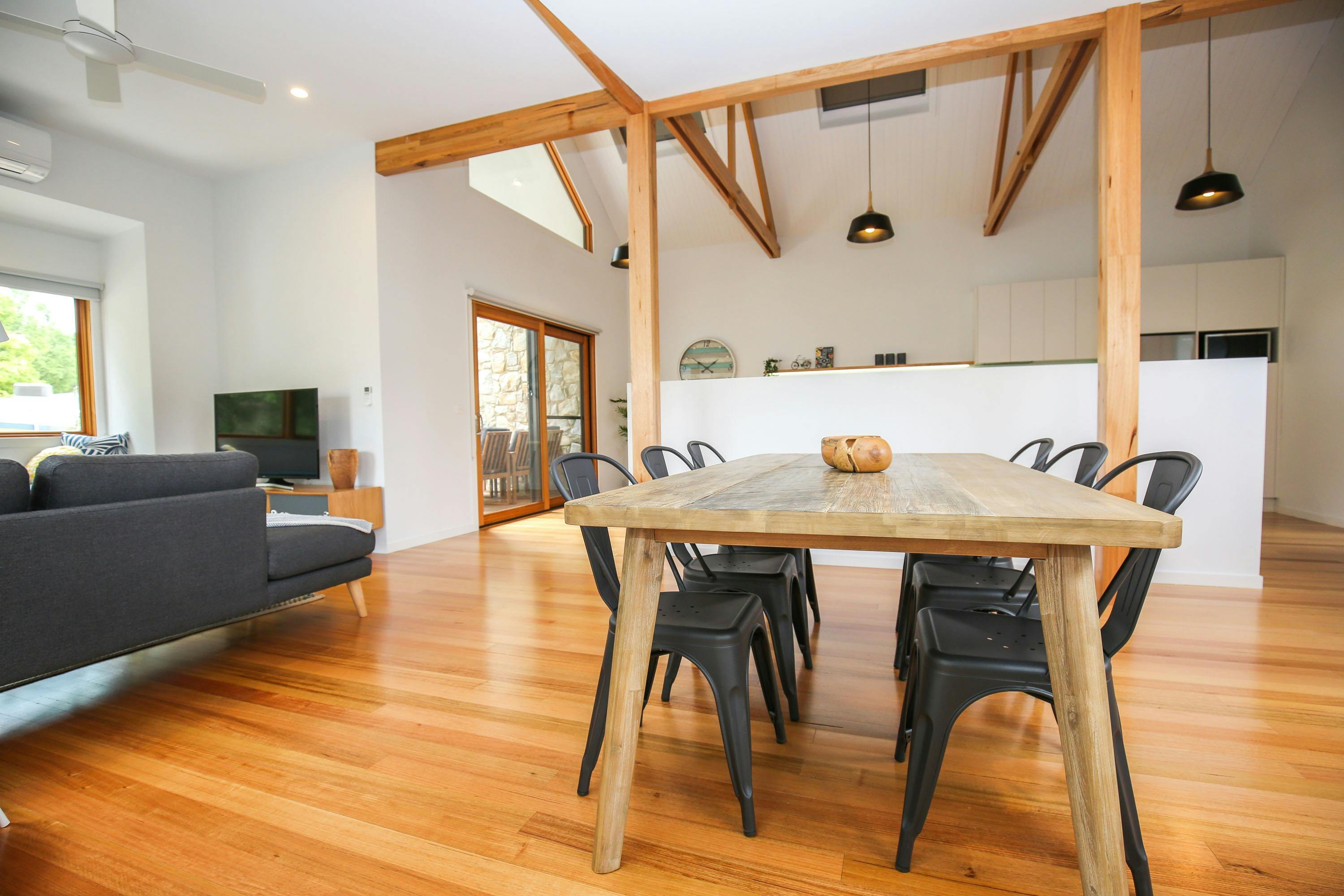 Dining area, living and kitchen at The Stelvio Villas Alpine Valley Getaways