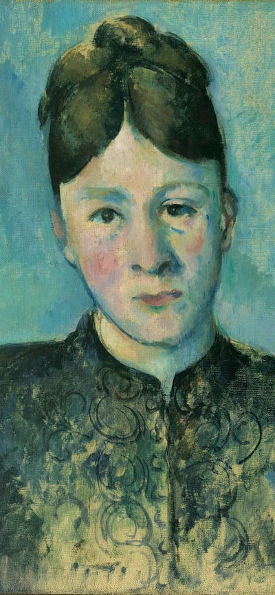 A front on portrait painting of Madame Cézanne with a blue background