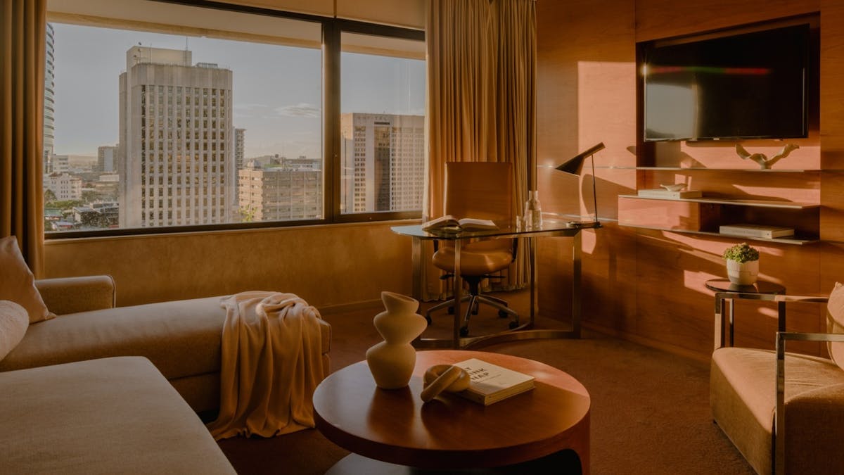 Suite lounge and work space at InterContinental Brisbane with sweeping city skyline views