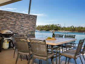 Outdoor dining area with water views
