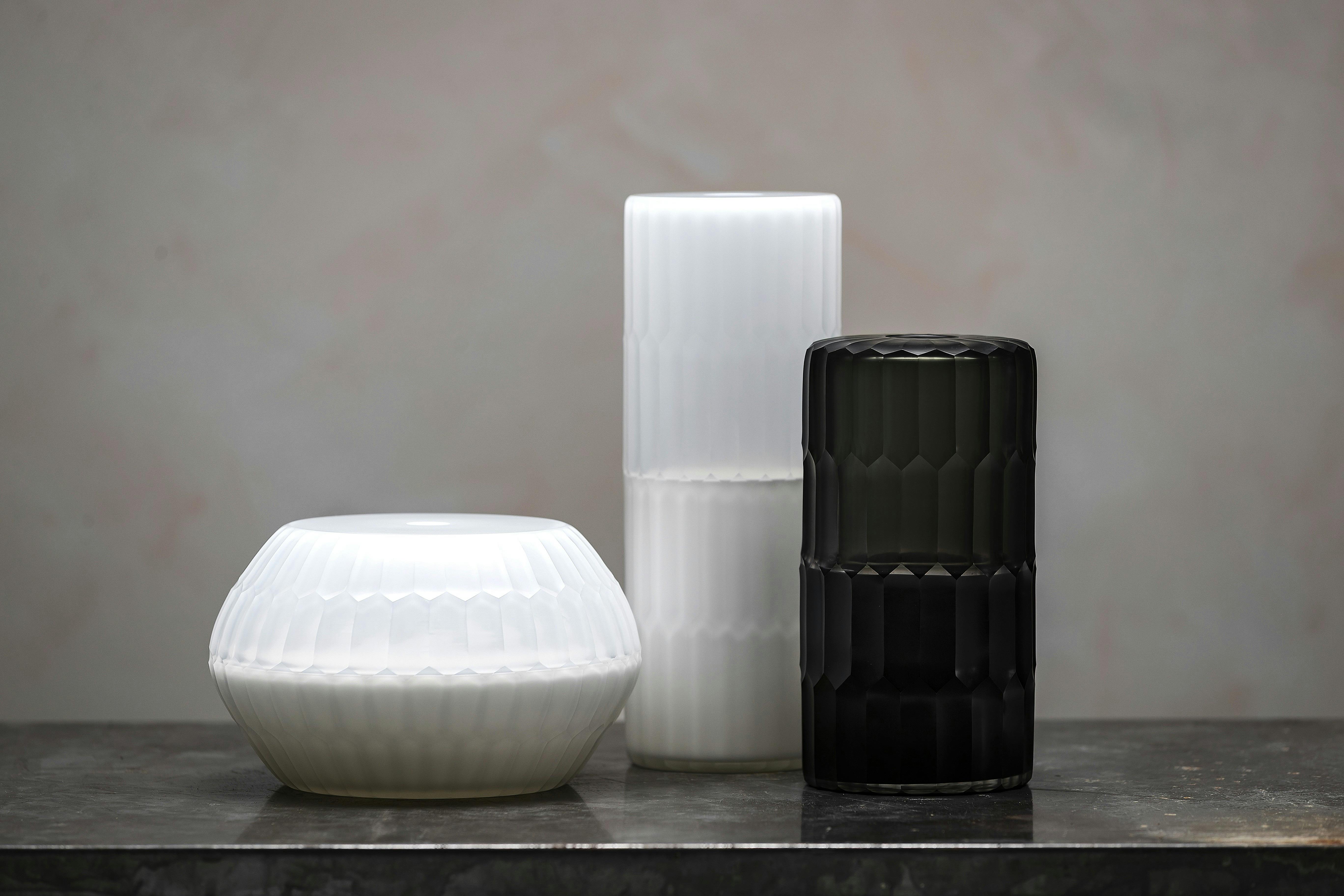 three glass vessels